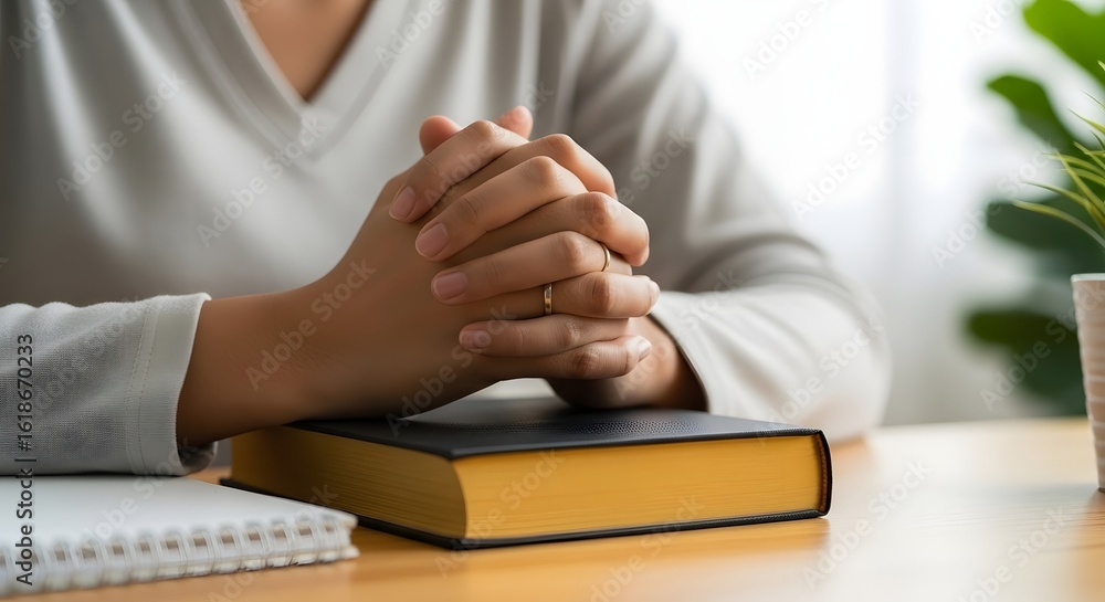 Obraz premium Woman praying with bible for faith hope and love seeking spiritual guidance and religious devotion