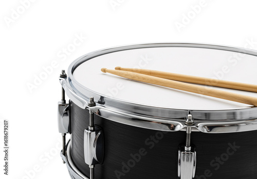 Close up of a black snare drum with wooden drumsticks resting on its white head isolated on transparent background
