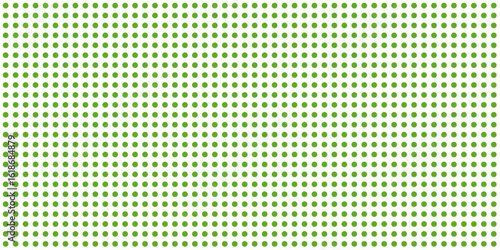Green polka dots in the white background