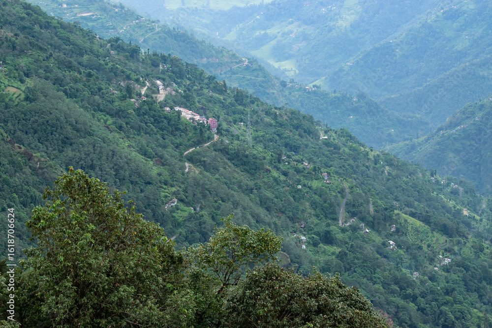 Scenic beauty of Green forests of Himalayan mountains, Okhrey, sikkim, India. Okhrey village is remote place in Sikkim where peaceful, tranquil Himalayan mountain range is enjoyed by tourists. Scenic beauty of Green forests of Himalayan mountains, Okhrey, sikkim, India. Okhrey village is remote place in Sikkim where peaceful, tranquil Himalayan mountain range is enjoyed by tourists.