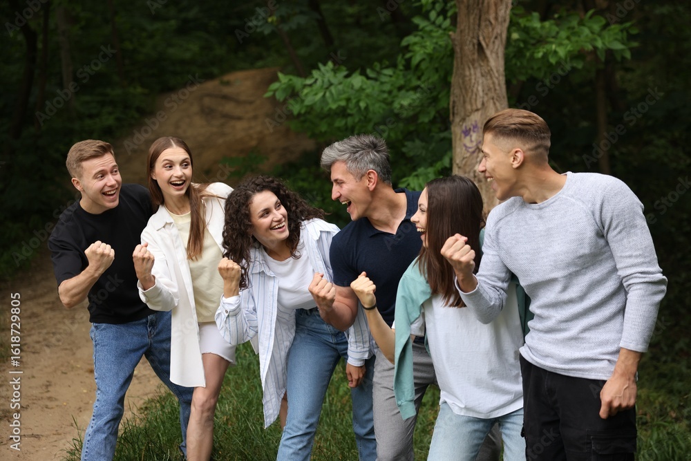 Team building. Group of happy people together outdoors Team building. Group of happy people together outdoors