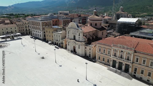 Italy, July 10, 2025: Aerial view of Piazza del Duomo in L'Aquila, Abruzzo region. Also known as the market square, it is the largest in the city.