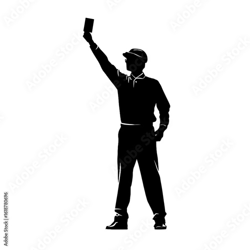 An umpire holding up a red card, demonstrating a moment of judgement.