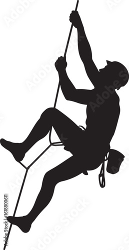 Silhouette of a climber ascending a rope climbing athletic