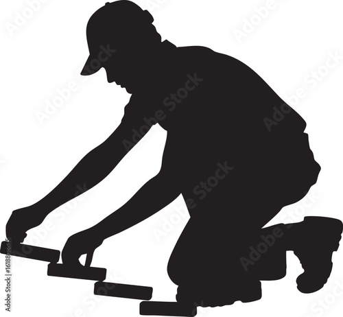 Silhouette of Construction Worker Laying Floor Tiles, Transparent Background.
