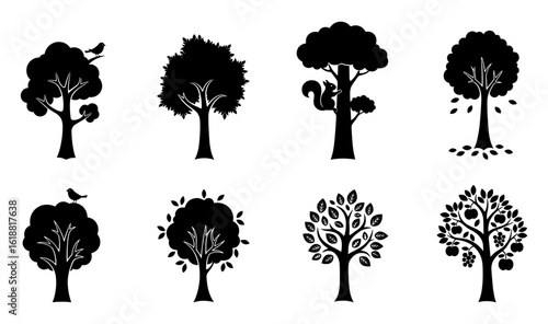 Various tree silhouettes featuring various shapes and leafy autumnal styles with birds and fruits