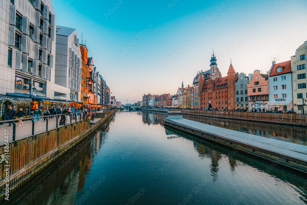 Fototapeta premium Gdansk with Motlawa river in Poland. Old town colourful house with Holy Spirit Gate