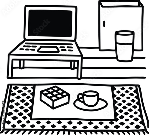 dorm with coffee mug laptop and patterned rug