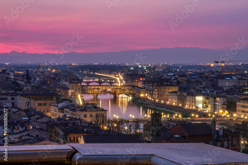 Romantic sunset over Ponte Vecchio in Florence, Italy.