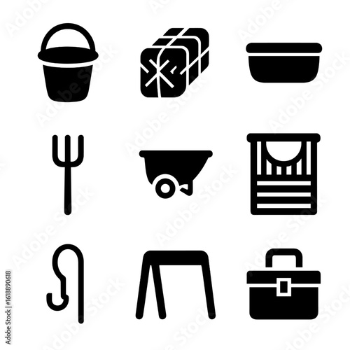 Equine Stable Icons. Solid, filled icon set of equine stable items: feed bucket, hay bale, water trough, pitchfork, muck cart,
