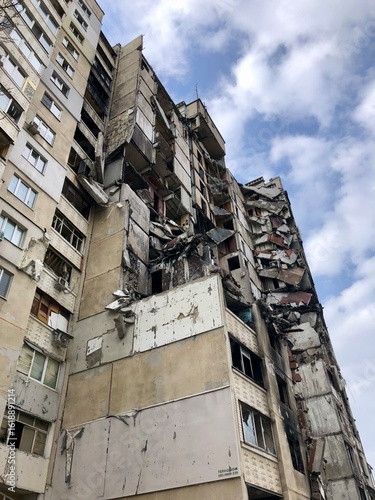Kharkiv, Ukraine - summer 2022–2025: Destroyed and burned apartments in a multi-storey residential building. Residential area Saltovka. War in Ukraine.