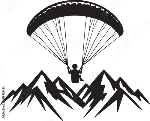 Paraglider soaring above jagged mountains paragliding skydiving