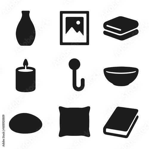 Minimalist Home Icons. Solid, filled icons set of minimalist home accents: single vase, framed print, folded