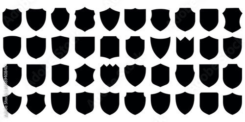 Shield silhouette icons. Shield silhouette vector set design. Medieval black silhouettes of different shapes, security and authority heraldic symbol, blank protection label. 