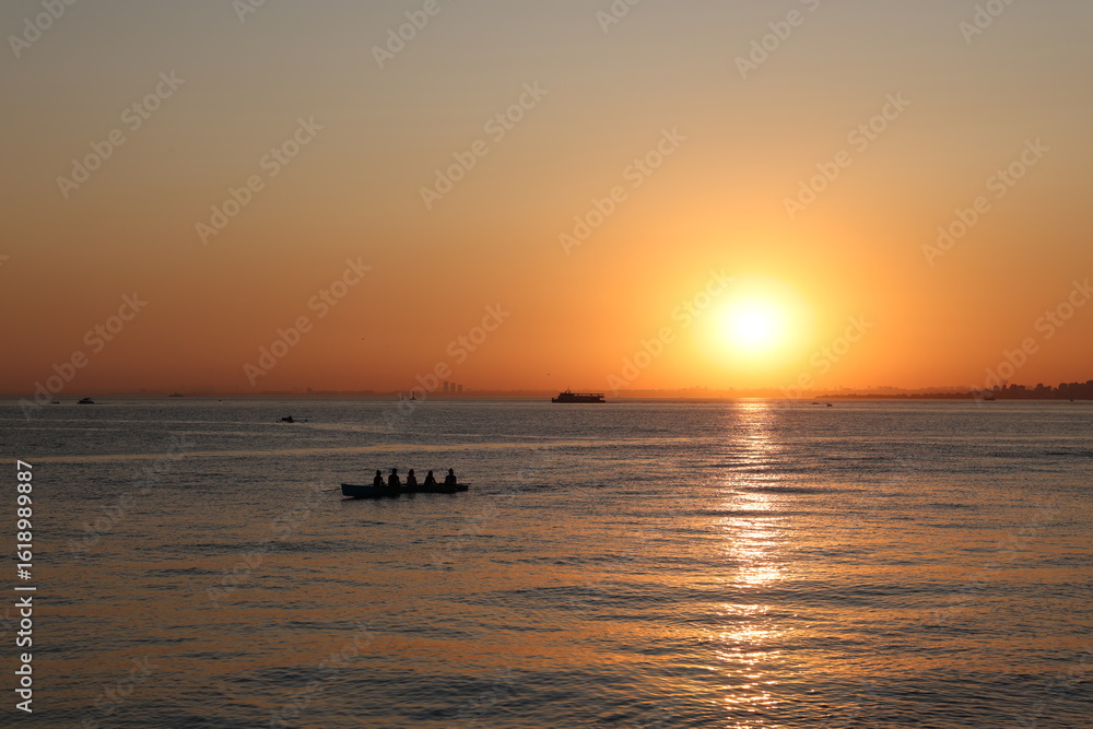 Beautiful sunset view. Amazing sea landscape. Burning sky and shining golden waves. Beautiful sunset view. Amazing sea landscape. Burning sky and shining golden waves.
