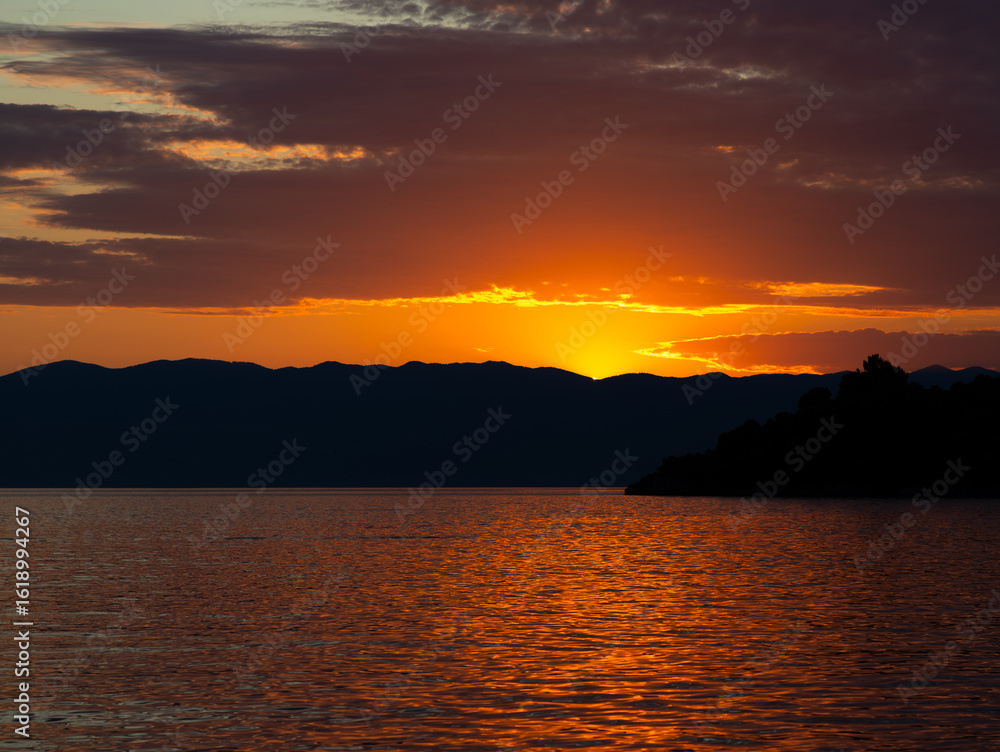 Fototapeta premium Magical sunset by the sea, on vacation in Croatia, Krk Island