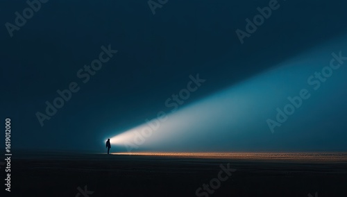 Lone figure illuminated, coastal fog, night, hope, website banner