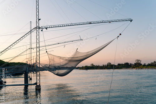 Bilde på lerret Fishing nets on the river Piave in Italy, just exactly where Piave meets the Adriatic Sea