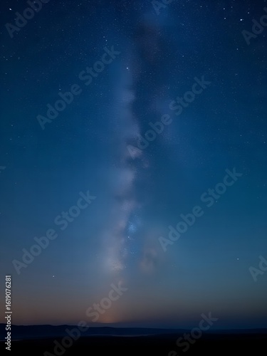 At night, the stars shine in the clear, cloudless sky.