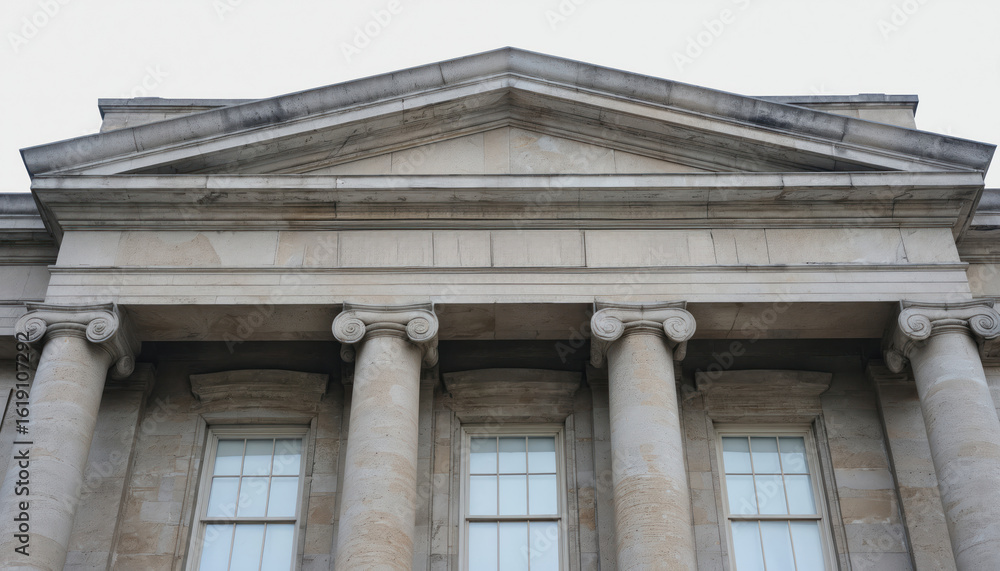 Obraz premium Classical stone architecture features prominent ionic columns supporting triangular pediment above windows. Building governmental judicial power, with strong neoclassical facade ideal for themes of