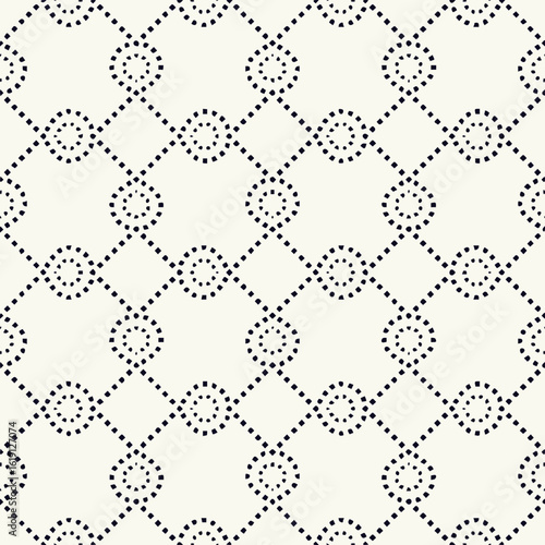 Seamless pattern of small black squares forming a diamond grid with circular dotted elements repeated regularly