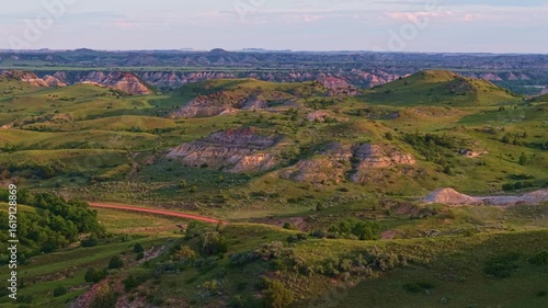 Scenic vibrant view of Roosevelt National Park colorful Canyons under sunset sun