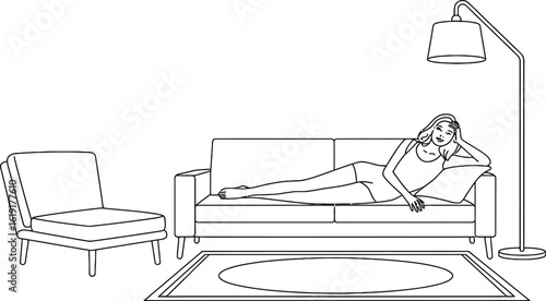 Woman relaxing on a couch with a floor lamp and armchair