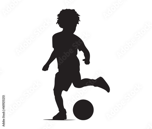 Black silhouette of a child kicking a ball.