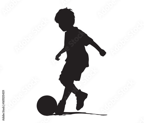 Black silhouette of a child kicking a ball.
