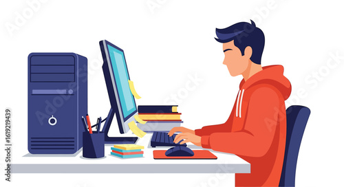 A young man, wearing a red hoodie, works on a computer at a desk, typing and focused.