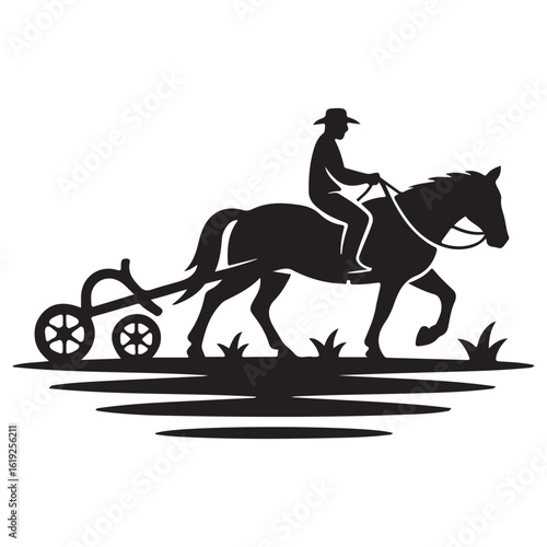 Silhouette of a cowboy riding a horse pulling a plow through a field at sunset