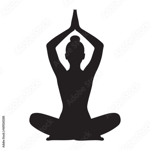 Silhouette of a person in a meditative yoga pose with hands pressed together above their head