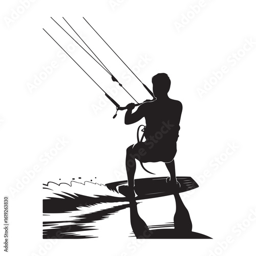 Silhouette of a kitesurfer in action riding a board on the water with a kite soaring high above