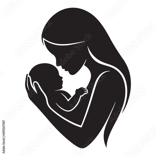 Silhouette of a loving mother tenderly holding and gazing at her newborn baby in a warm embrace