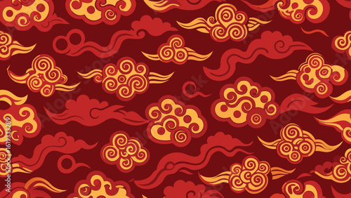 Seamless pattern of clouds on a red background
