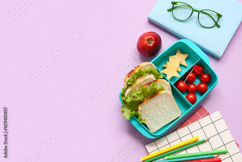 Lunch box with tasty food a...