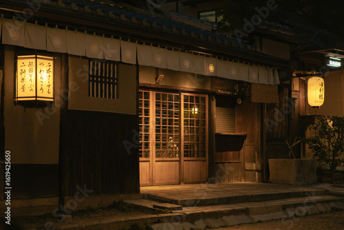 a dimly lit store front in Kyoto