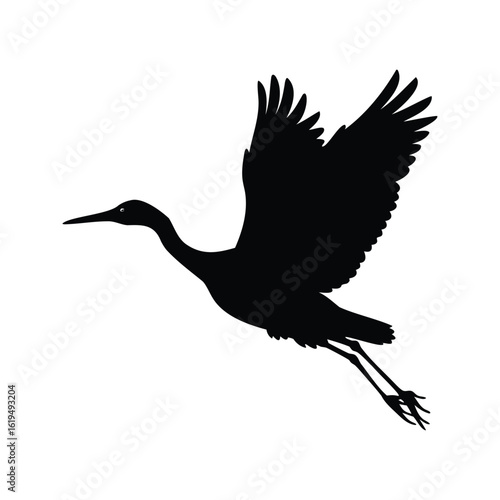 Silhouette of a Sandhill Crane in Flight Against a White Background