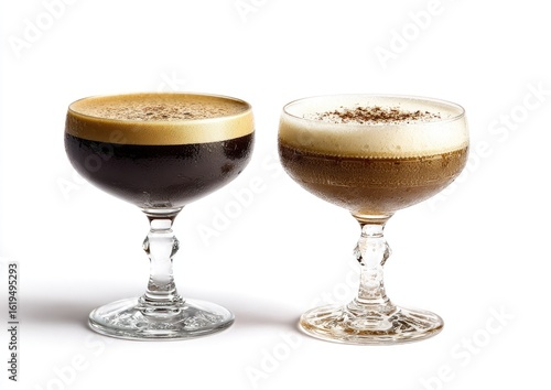 Two coffee cocktails in coupe glasses, one with a thicker crema layer