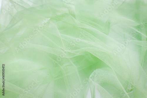 Papier peint A close-up photo of beautiful, elegant, soft, detailed, textured, and wavy tulle fabric