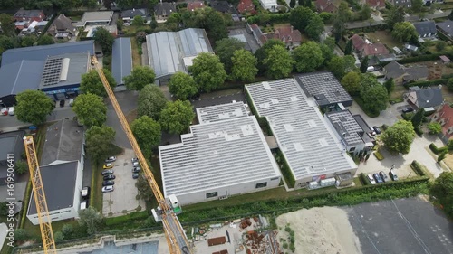 Wallpaper Mural Beautiful aerial orbit of photovoltaic solar panels on thee rooftops of newly built industrial building on a sunny day Torontodigital.ca