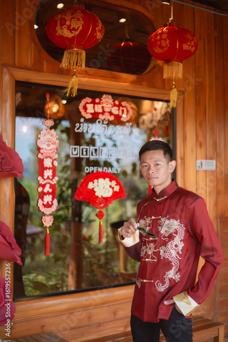 A man dressed in Chinese New Year clothing