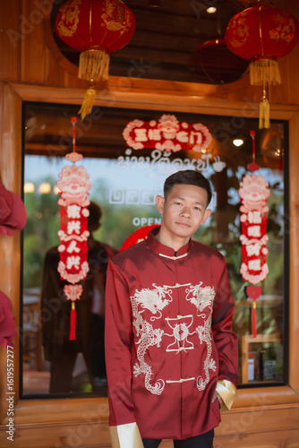 A man dressed in Chinese New Year clothing