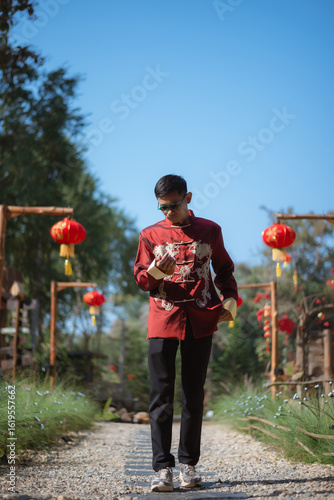 A man dressed in Chinese New Year clothing