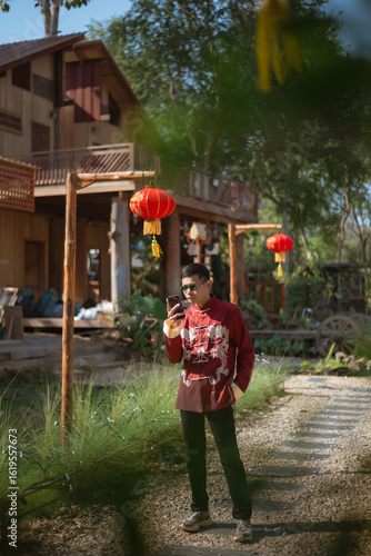 A man dressed in Chinese New Year clothing