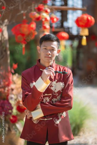 A man dressed in Chinese New Year clothing