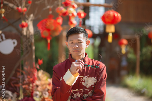 A man dressed in Chinese New Year clothing