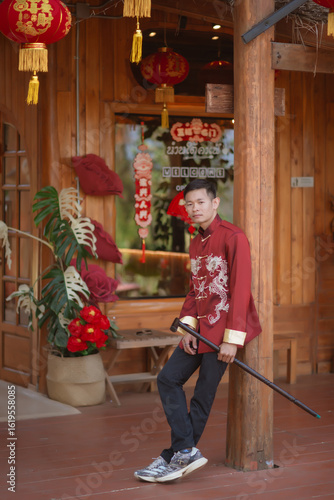 A man dressed in Chinese New Year clothing