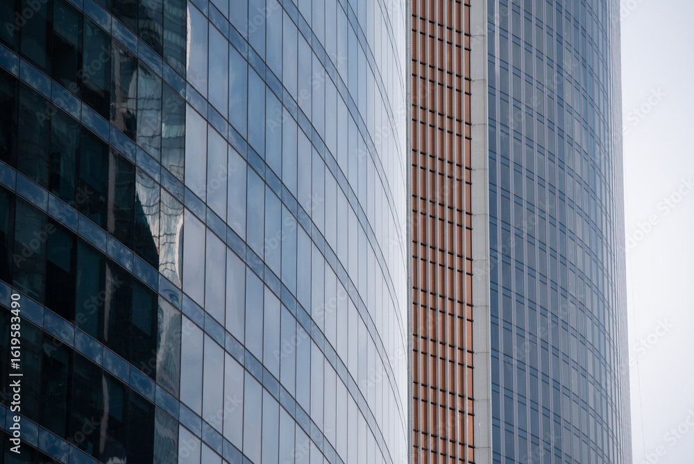 Fototapeta premium walls and empty windows of a modern building on a big city street without people