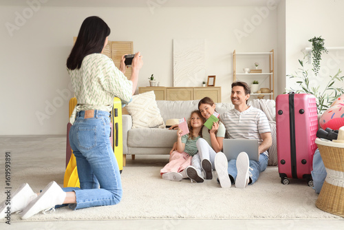 Family of tourists with pas...